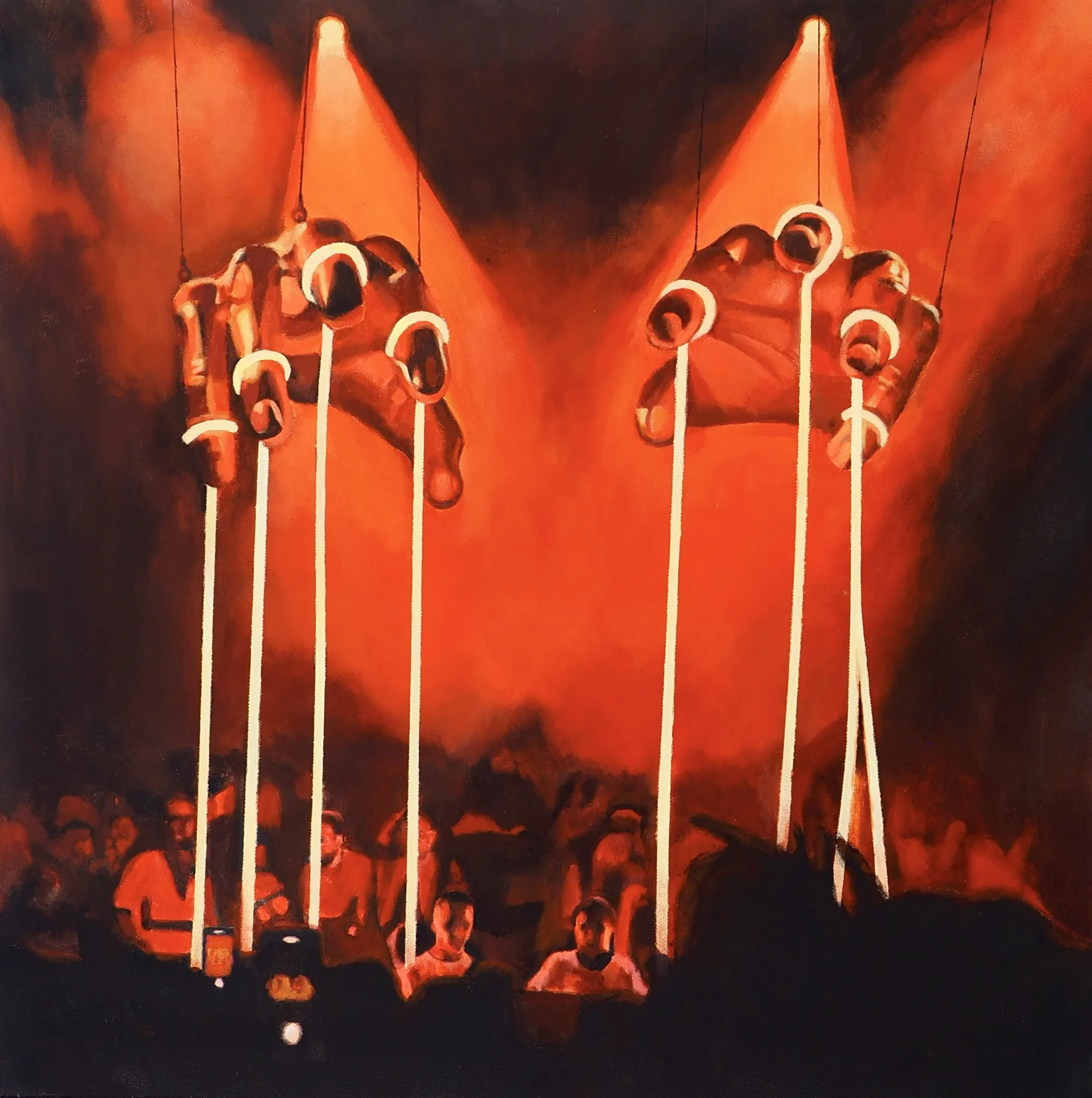 One of the two Prospa paintings, hands above a crowd under stage light